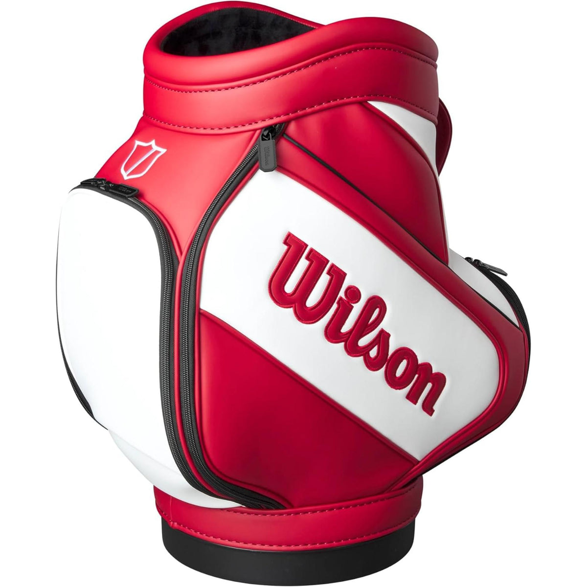 Wilson Golf Tour Range Caddie bag in red and white with large Wilson logo, compact design, and zippered storage pocket, shown on a white background.