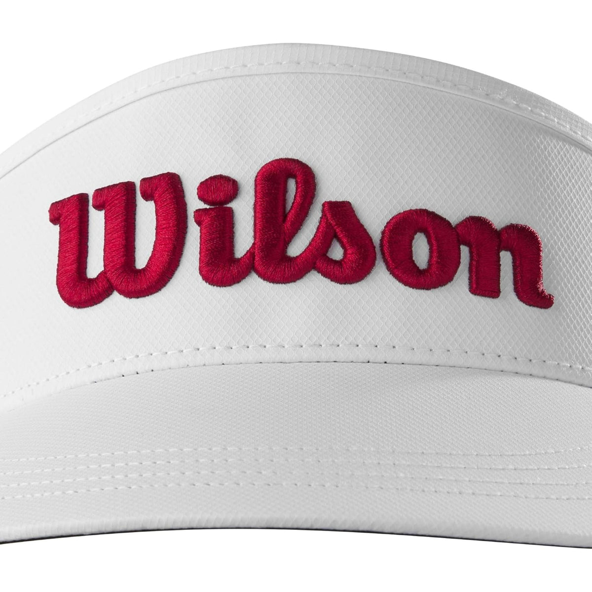 Wilson Golf Tour visor featuring a lightweight design with an embroidered Wilson logo, providing breathable comfort and sun protection on the course.