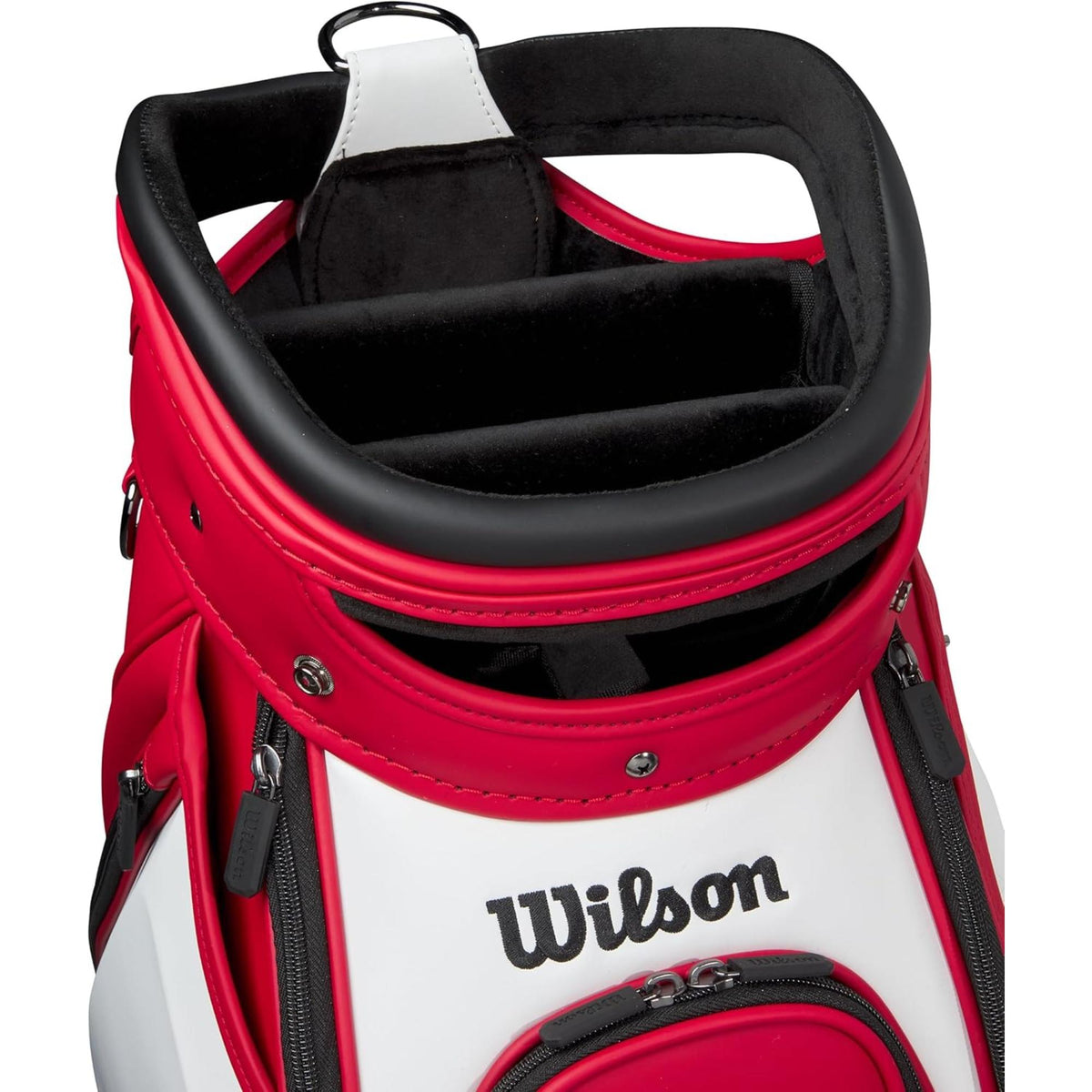 Wilson Golf Staff Tour cart bag in red and white with large Wilson logo, premium structured design, and multiple zippered storage pockets, displayed on a white background.