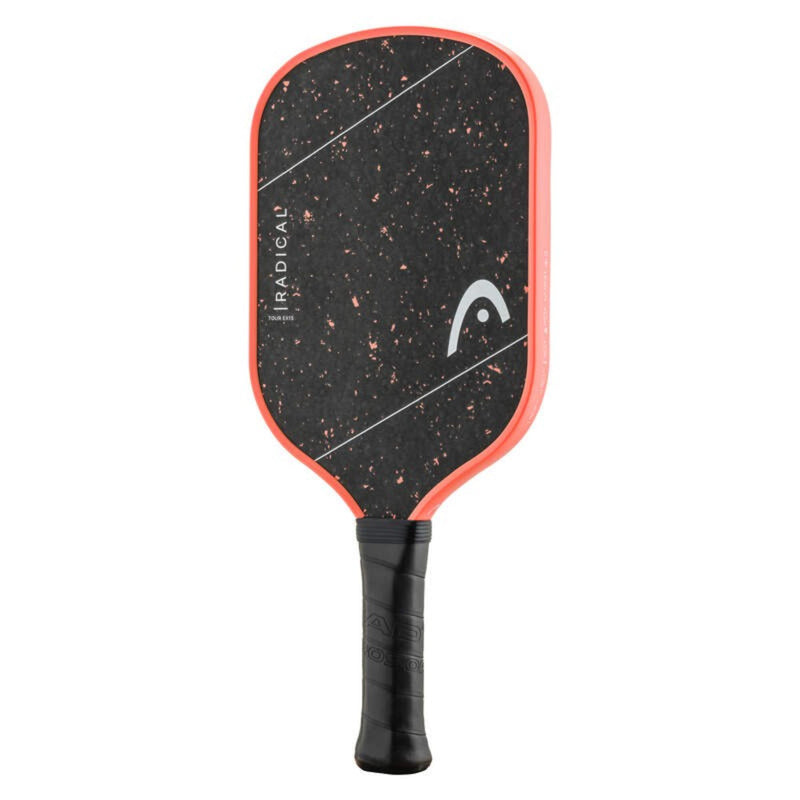 Front view of Head Radical Tour EX pickleball paddle with black speckled face, orange edge guard, bold white HEAD logo, and black cushioned grip.