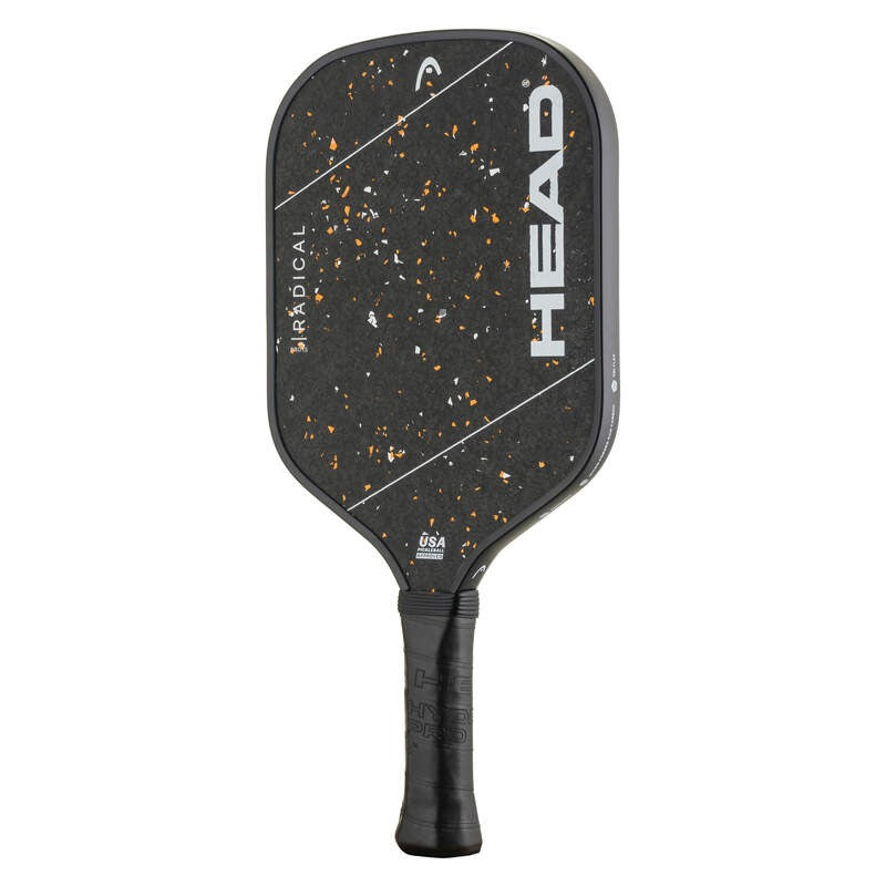 Front view of Head Radical pickleball paddle with black and gold speckled face, white HEAD logo, and black cushioned grip.