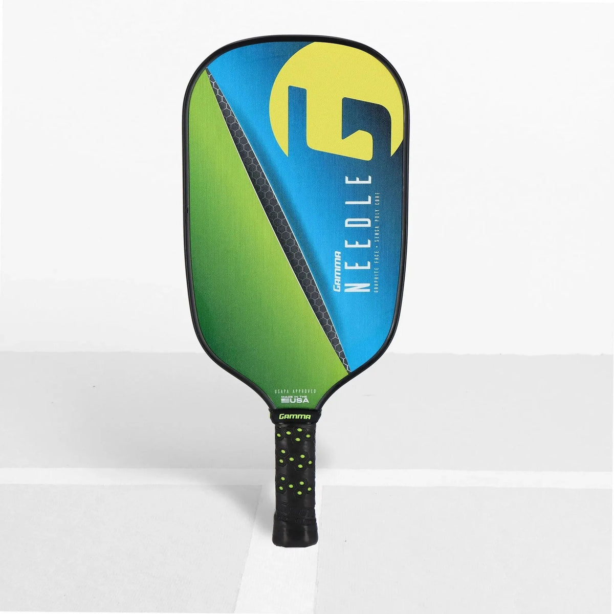 Pickleball paddle with a textured face, elongated shape, and cushioned grip handle designed for control and performance.