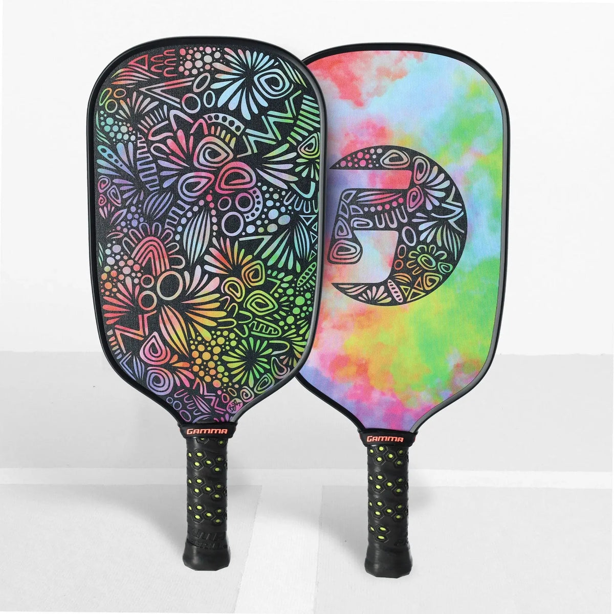 Pickleball paddle with a textured face, elongated shape, and cushioned grip handle designed for control and performance.