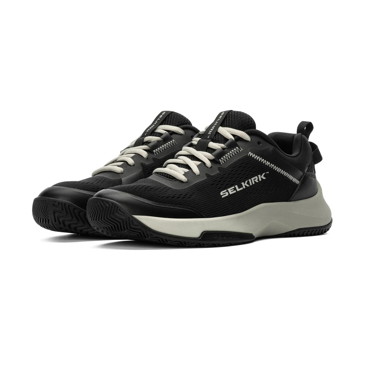 Selkirk Sport men’s CourtStrike pickleball shoes with lace-up closure, cushioned sole, and low-profile athletic design, shown as a pair.