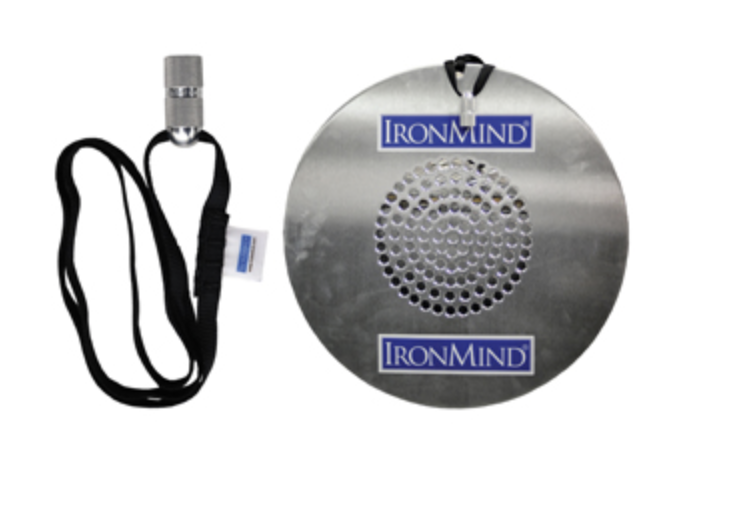 A Silver Bullet Disc gripper with a textured surface and a CoC Silver Bullet hold, accompanied by a black strap and a branded label.