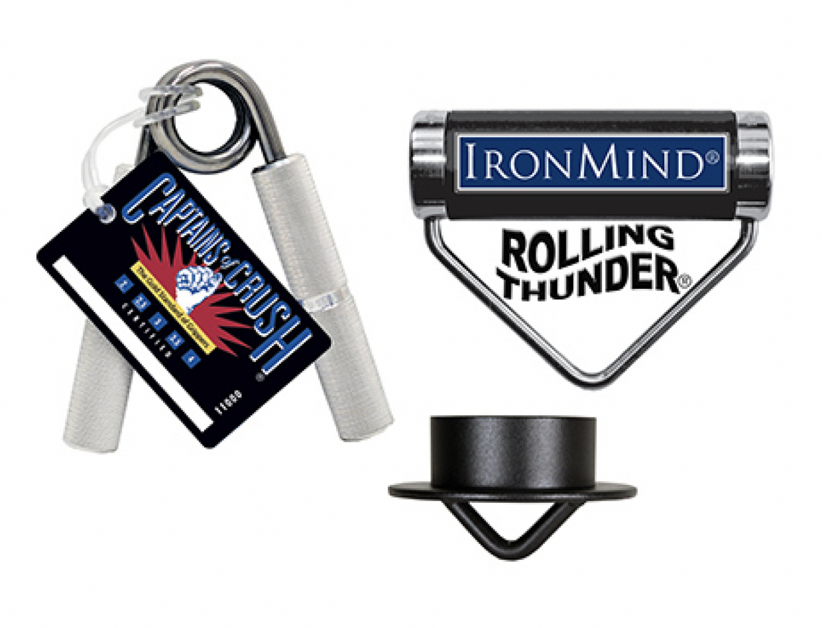 An IronMind Crushed to Dust Challenge kit which includes a silver gripper, a black hub, and a rolling thunder handle.